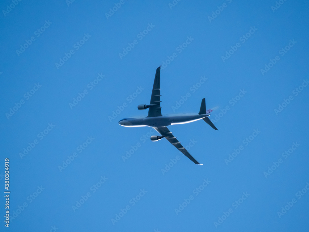 Aeroplane flying high above Sydney Harbour Australia Aeroplane flying high above Sydney Harbour Australia