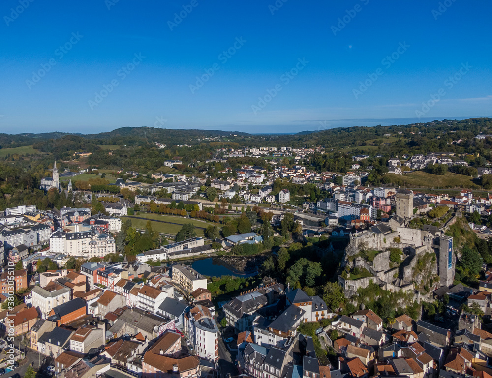 Aerial view of Sanctuary of Our Lady of Lourdes and Chateau fort de Lourdes, France
