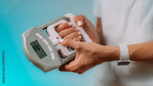 Using Hand Dynamometer for Grip Strength Test photo