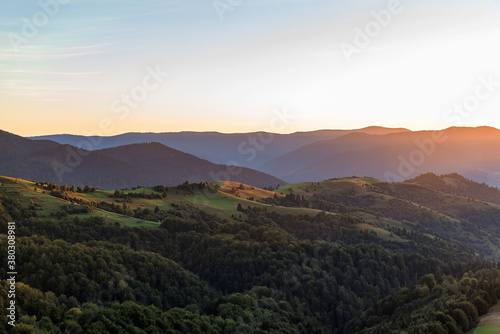 Beautiful sunset on the background of the mountain landscape. Carpathians.