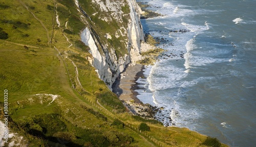 white cliffs of dover grass clear sky sea england