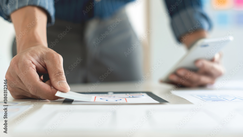 ux designer creative planning application development near layouts of mobile smartphone frameworks, User experience concept. ux designer creative planning application development near layouts of mobile smartphone frameworks, User experience concept.