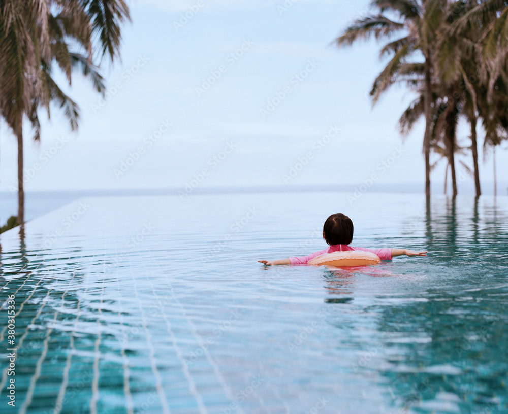 little girl playing in the pool little girl playing in the pool