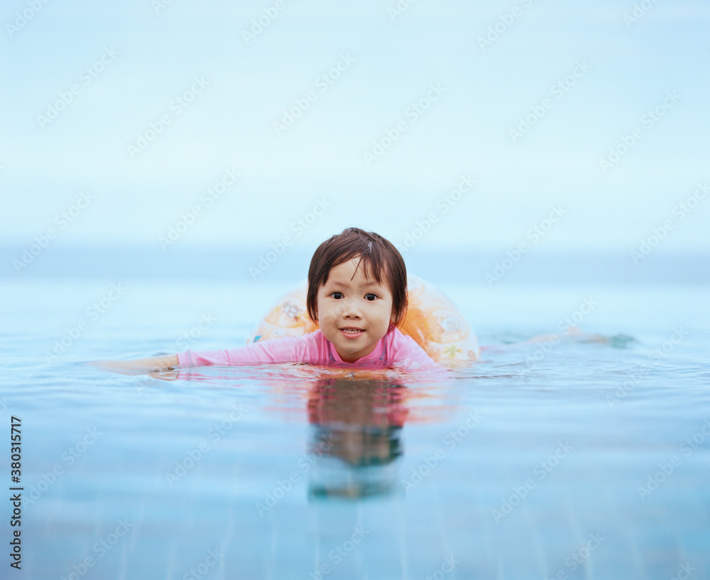 little girl playing in the pool little girl playing in the pool