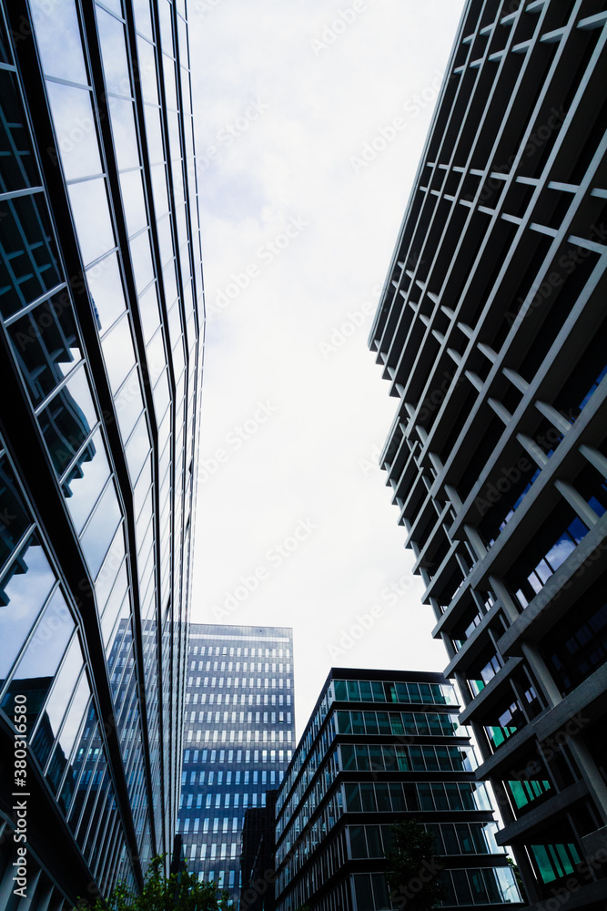 Background of tall skyscrapers seen from below