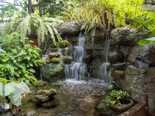 Waterfall garden with rocks and trees
