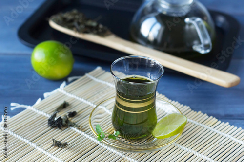 Photography turkish green tea in a traditional glass glass