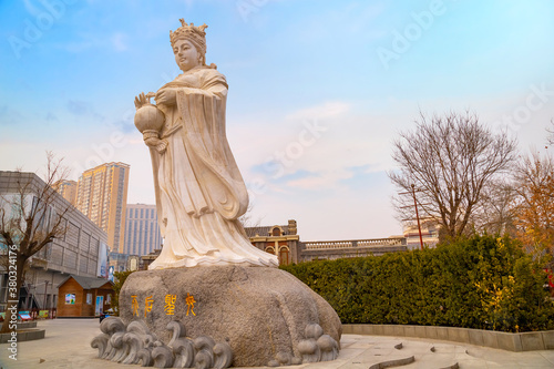 Mazu is a Chinese sea goddess,  adjacent to Tianhou Temple at Guwenhua Jie street in Tianjin, China photo