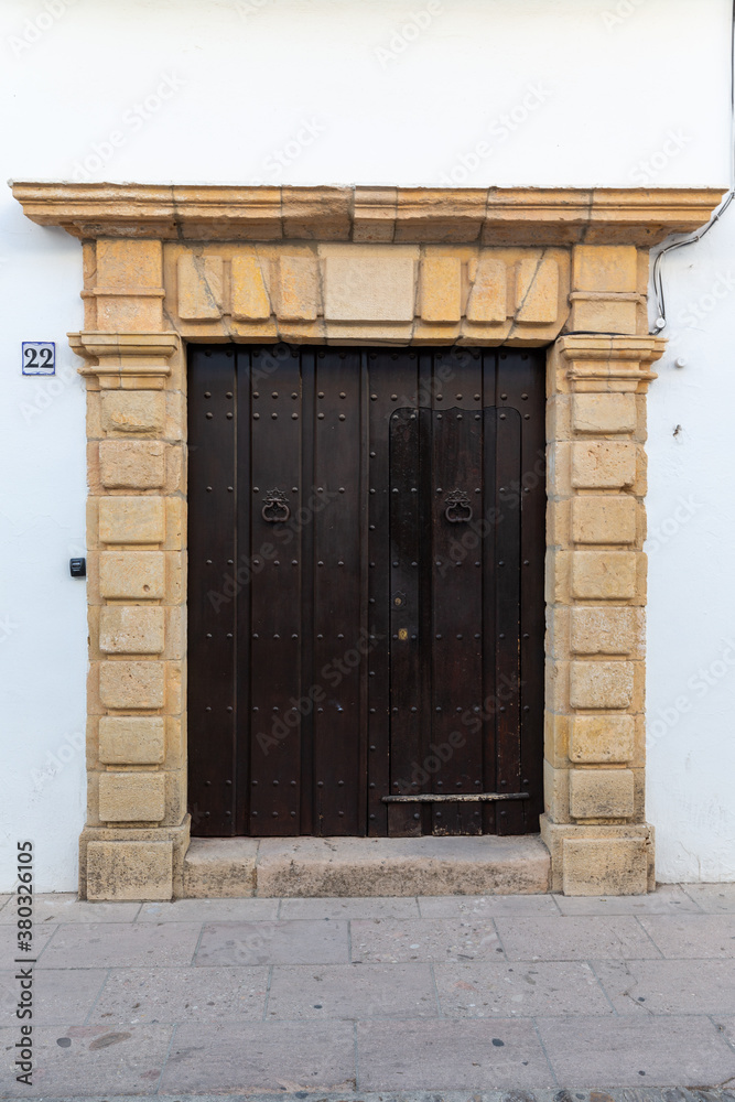 Fototapeta premium Old door of a house in the old town of Ronda, Andalusia, Spain.