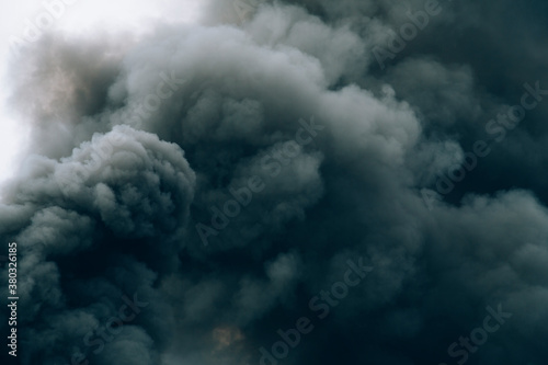 Smoke rising into sky from 5-alarm fire