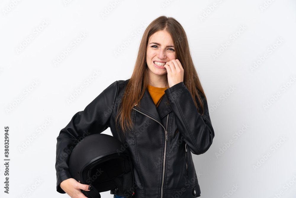 Woman with a motorcycle helmet nervous and scared Woman with a motorcycle helmet nervous and scared