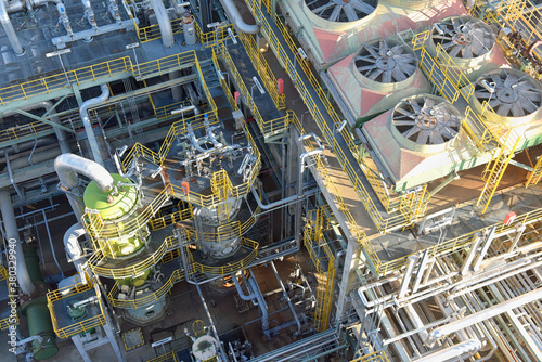 pipelines and buildings of a refinery - industrial plant for fuel production