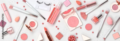 Obraz Beauty cosmetic makeup background. Fashion woman make up product, brushes, lipstick, nail polish collection. Creative pink concept. Cosmetology make-up accessories banner, top view.