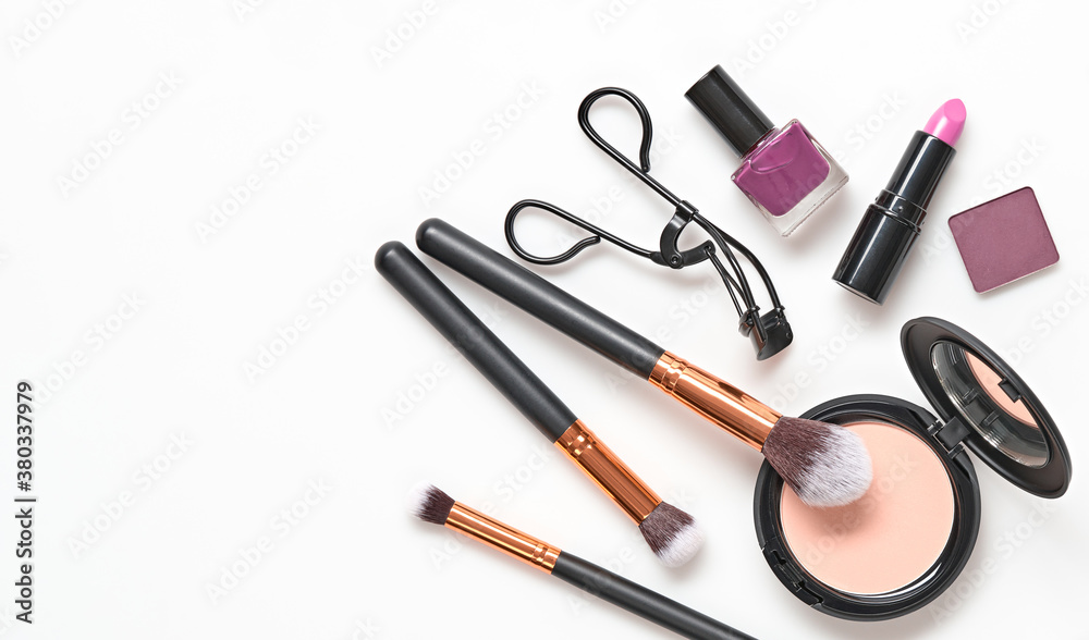 Beauty cosmetic makeup background. Fashion woman make up product, brushes, lipstick, nail polish layout. Creative concept. Cosmetology make-up accessories on white, banner, top view. Beauty cosmetic makeup background. Fashion woman make up product, brushes, lipstick, nail polish layout. Creative concept. Cosmetology make-up accessories on white, banner, top view.