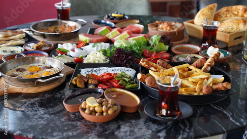Turkish breakfast table in restaurant background. 