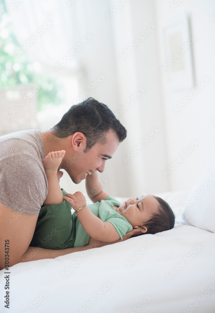 Father playing with his son (6-11 months) Father playing with his son (6-11 months)