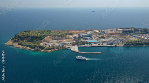 Fototapeta Naklejka Na Ścianę i Meble -  Aerial drone photo of small island of Psitaleia, a latest technology industrial sewage plant near port of Piraeus, Attica, Greece