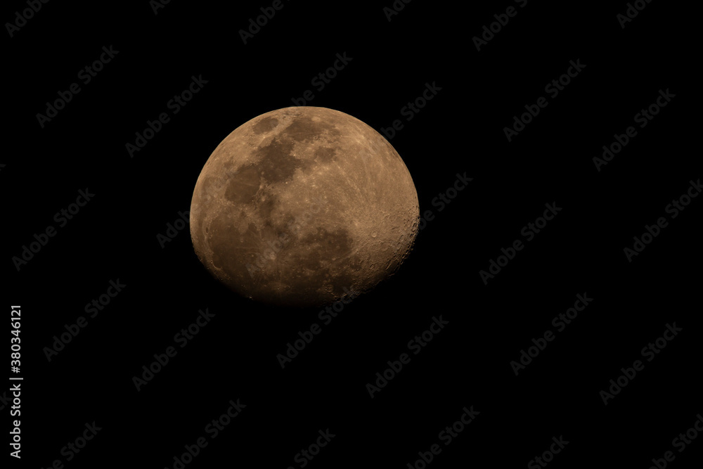 The moon is not full after the sun goes down, the sky is black and there is space on the side for typing characters. The moon is not full after the sun goes down, the sky is black and there is space on the side for typing characters.