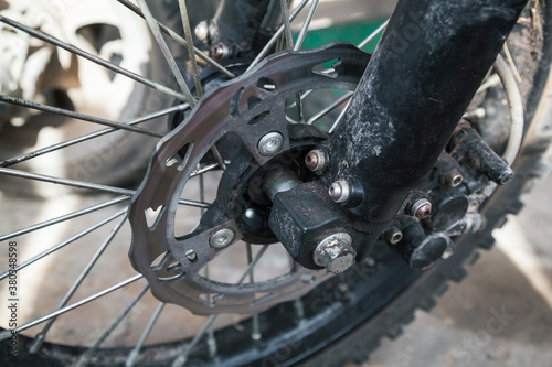 The rear wheel and brake system of the motorcycle.