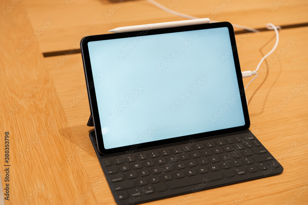 Tablet with empty screen on table