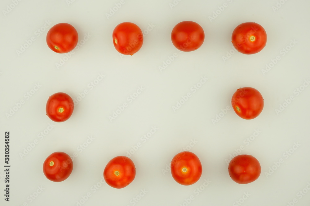 Frame of red cherry tomatoes. Healthy or diet food concept, food background. Top view, copy space, flat lay. Frame of red cherry tomatoes. Healthy or diet food concept, food background. Top view, copy space, flat lay.