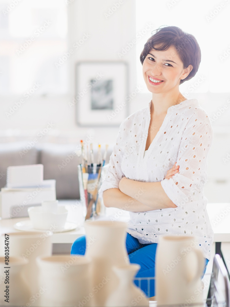 Portrait of smiling woman in art studio Portrait of smiling woman in art studio