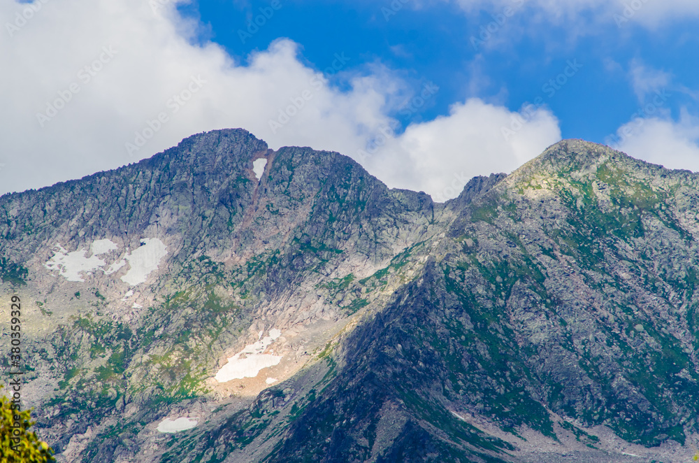 Fototapeta premium View from high mountain. clouds in the sky