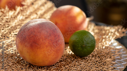 Fruit in a wooden bowl. Pea...