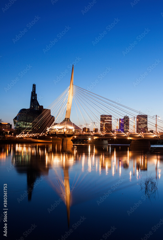 Canadian Museum for Human Rights and Esplanade Riel bridge at dusk Canadian Museum for Human Rights and Esplanade Riel bridge at dusk