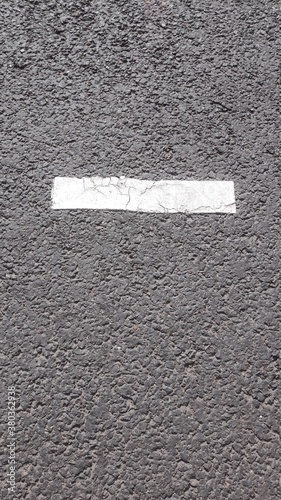 arrow sign on asphalt