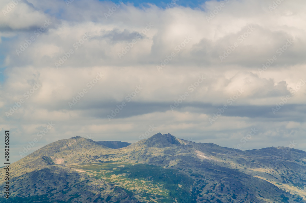 View from high mountain. clouds in the sky View from high mountain. clouds in the sky