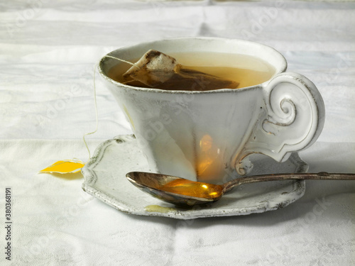 Antique teacup on table