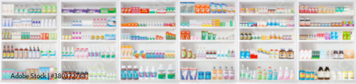 pharmacy drugstore shelves blur pharmaceutical medicine product background © Piman Khrutmuang