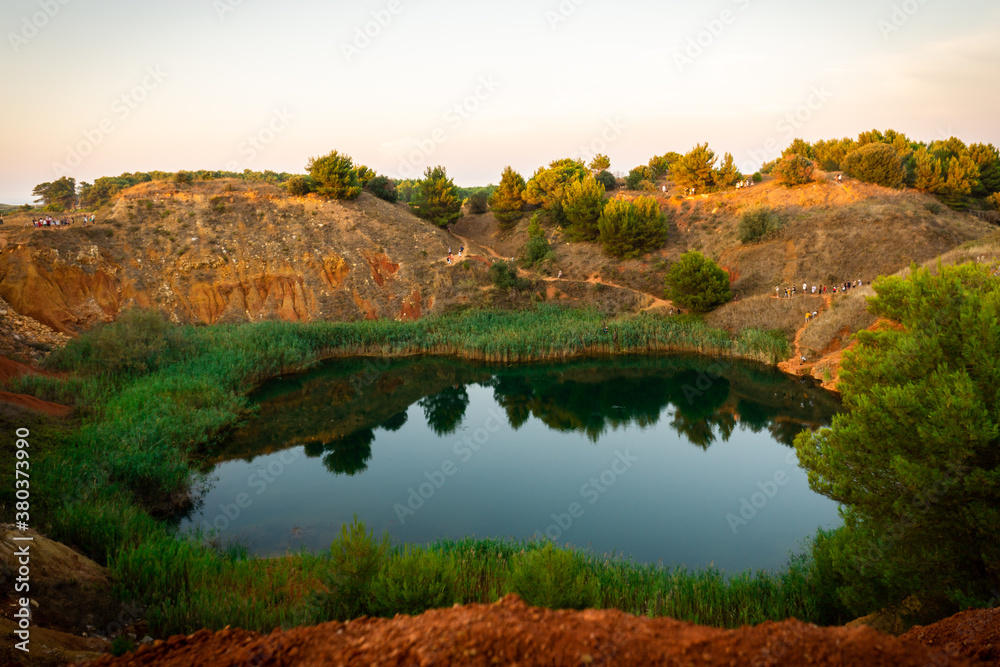 Bauxite Mine with Lake at Otranto at sunset, Apulia, Italy