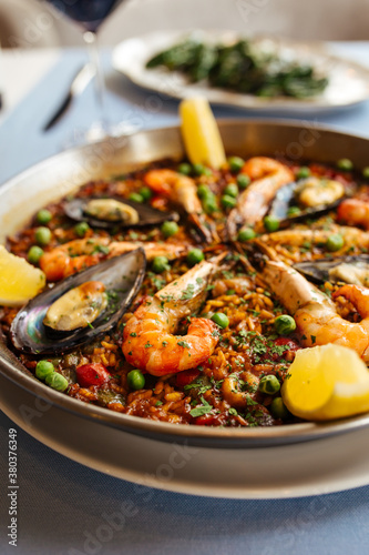 Spanish rice dish paella with seafood in a pan
