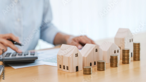 Close up woman calculating property valuation. photo