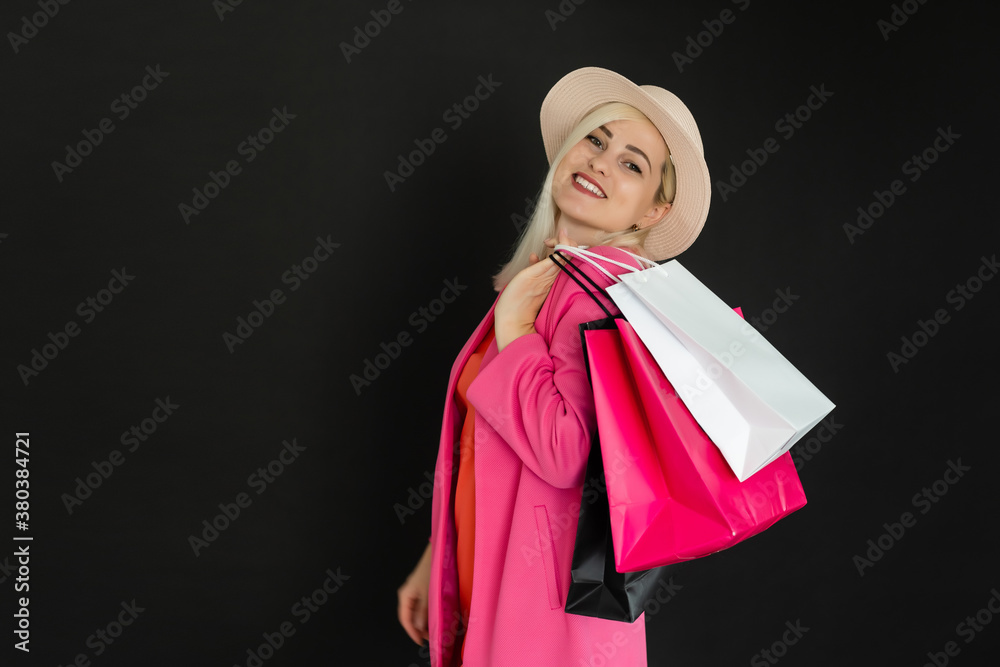 woman with shopping bags on black friday