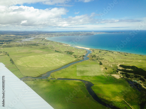 view from the plane approaching the coast of Tasmania, Australia photo