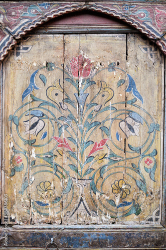 Beautiful polychromed wooden door photo