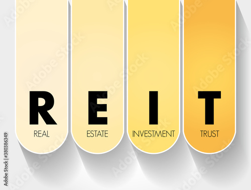 REIT - Real Estate Investment Trust acronym, business concept background