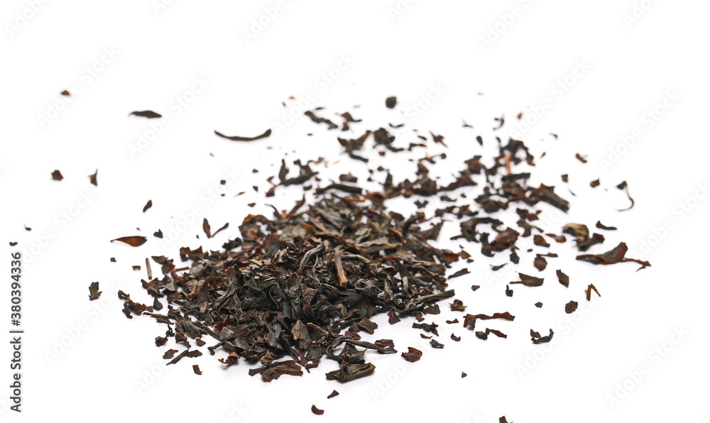 Dry black tea leaves isolated on white background, close up Dry black tea leaves isolated on white background, close up