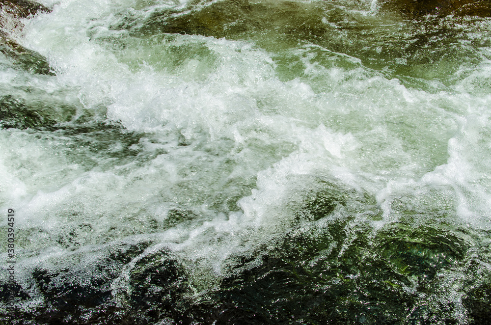 in summer rocky mountain river water silk. mountain river in summer rocky mountain river water silk. mountain river