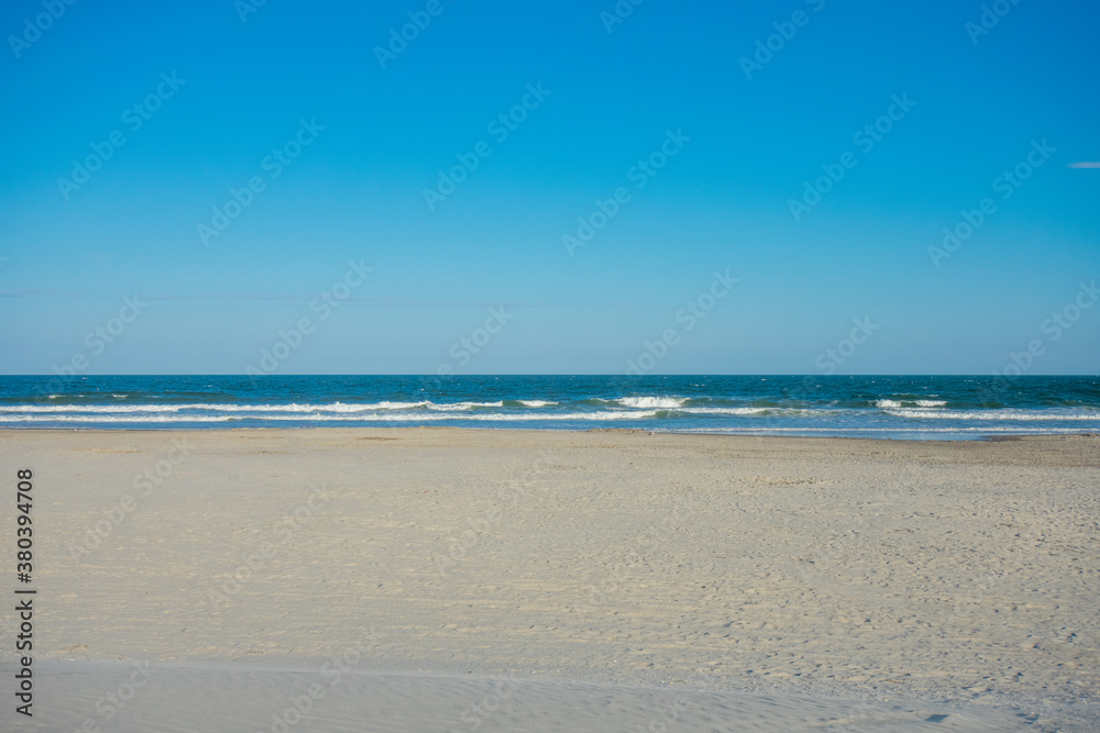An Empty Beach and Ocean at Wildwood New Jersey An Empty Beach and Ocean at Wildwood New Jersey