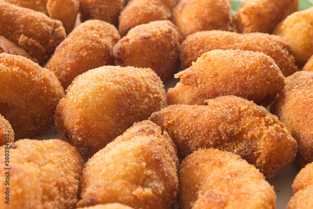 Close-up of delicious and crunchy golden croquettes. Learn easy cooking at home. Close-up of delicious and crunchy golden croquettes. Learn easy cooking at home.
