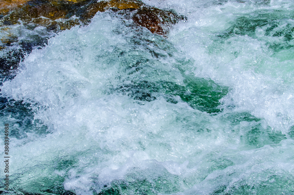 Obraz premium in summer rocky mountain river water silk. mountain river