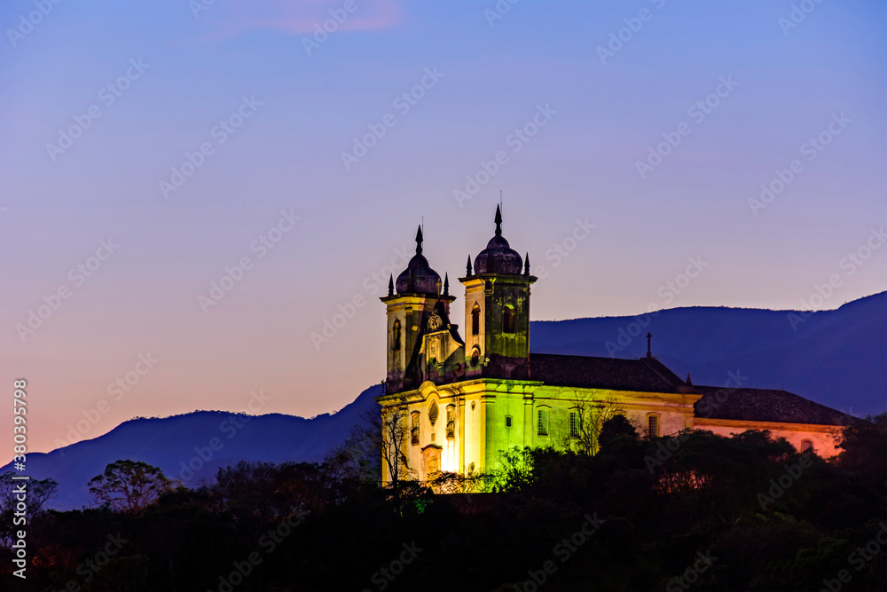 Night view of the historic 18th century church and hills at Ouro Preto city, Minas Gerais state, Brazil