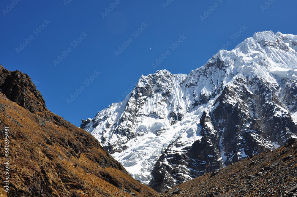 Snow capped mountains in the Andes along the Salkantay trek in Peru