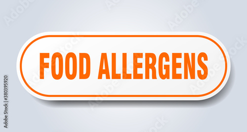 food allergens sign. rounded isolated button. white sticker