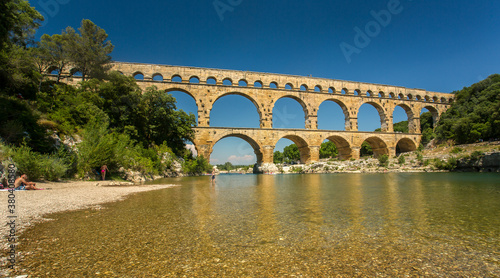 Avignon, France - 6/4/2015: Pont du Gard, a Mighty aqueduct bridge rising over 3 well-preserved arched tiers, built by 1st-century Romans.