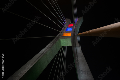 Closeup of a bridge at night